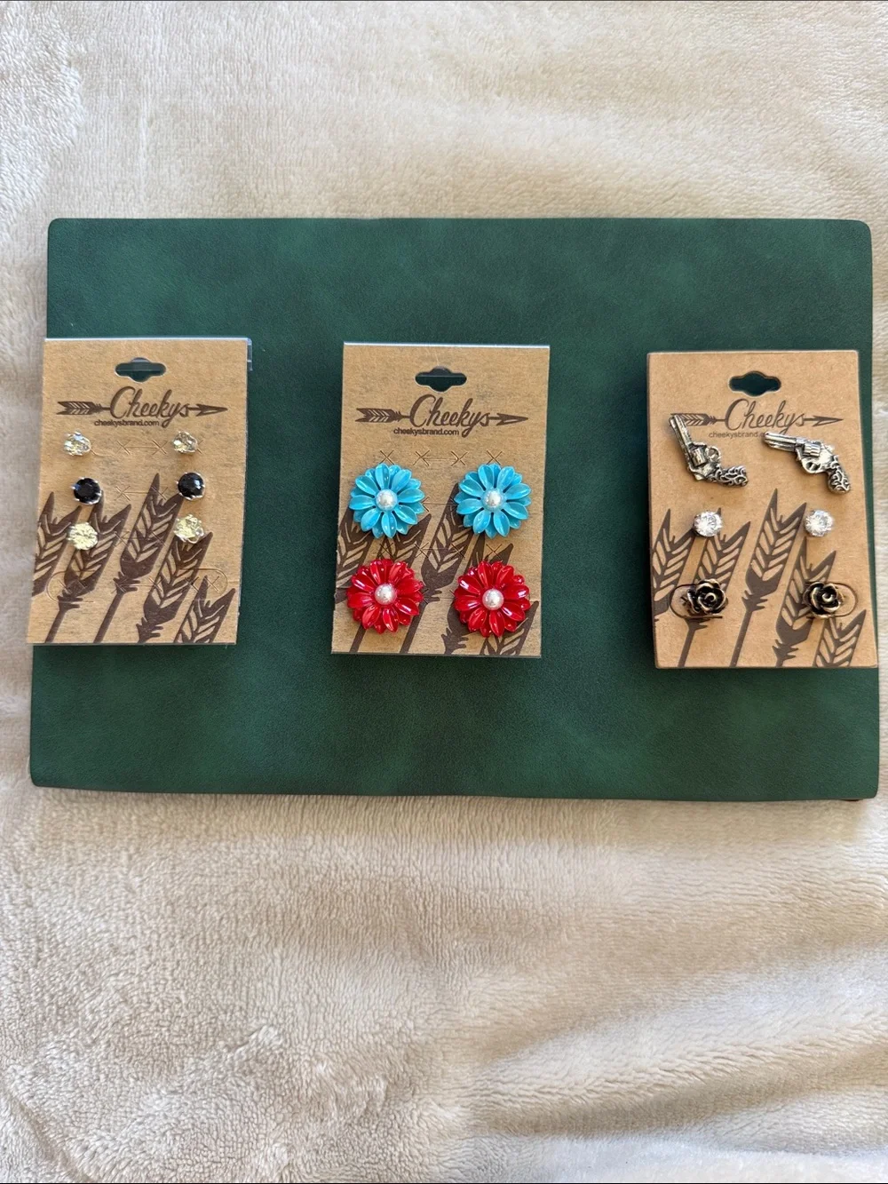 NWT - Never worn. Lot of 3 sets of earrings. Super cute.
